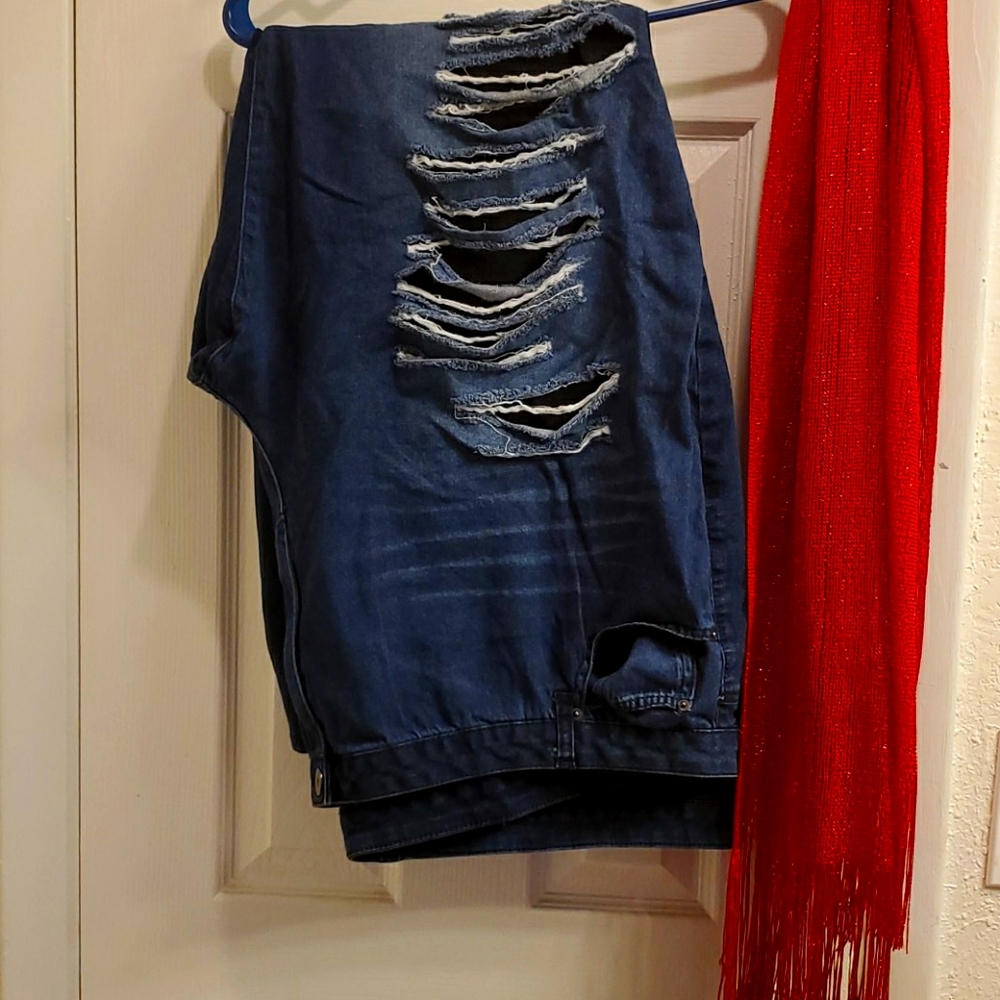 Distressed denim jeans